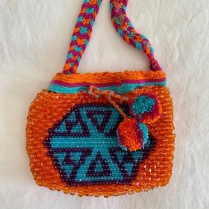 Handmade mini beaded drawstring purse